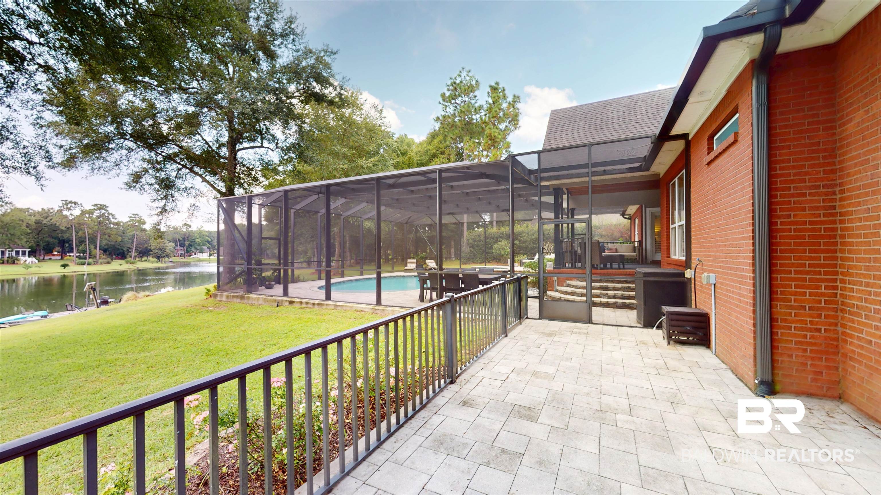 8775 Dawes Lake Road North Mobile, AL 36619 - Photo 47 of 59 View of patio featuring a water view, an outdoor pool, and glass enclosure