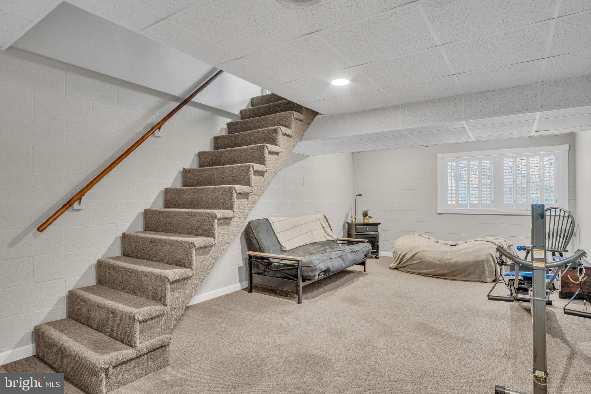 224 Faith Circle Carlisle, PA 17013 - Photo 20 of 32 a living room with furniture and stairs