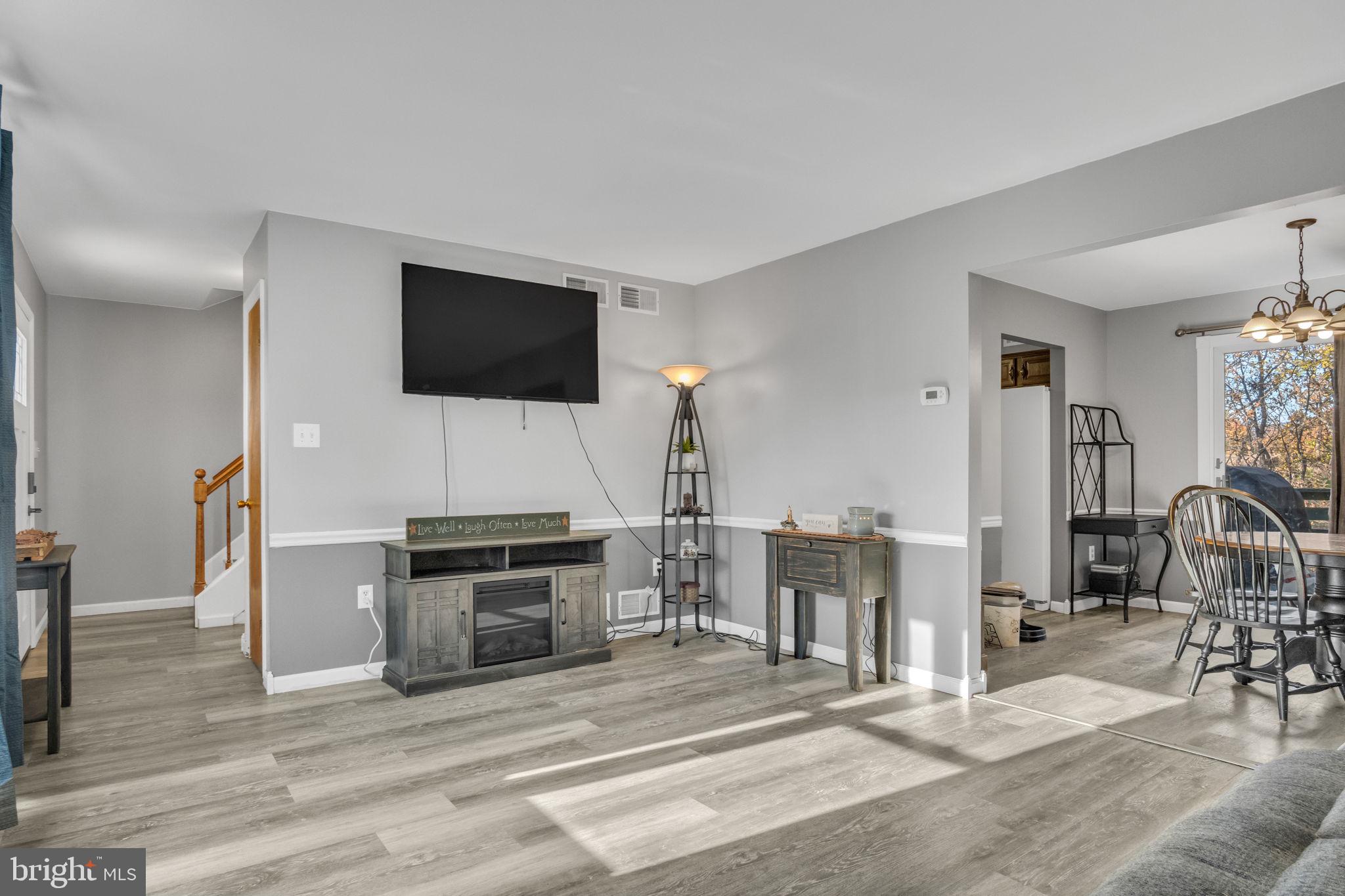 224 Faith Circle Carlisle, PA 17013 - Photo 3 of 32 a living room with furniture and a flat screen tv