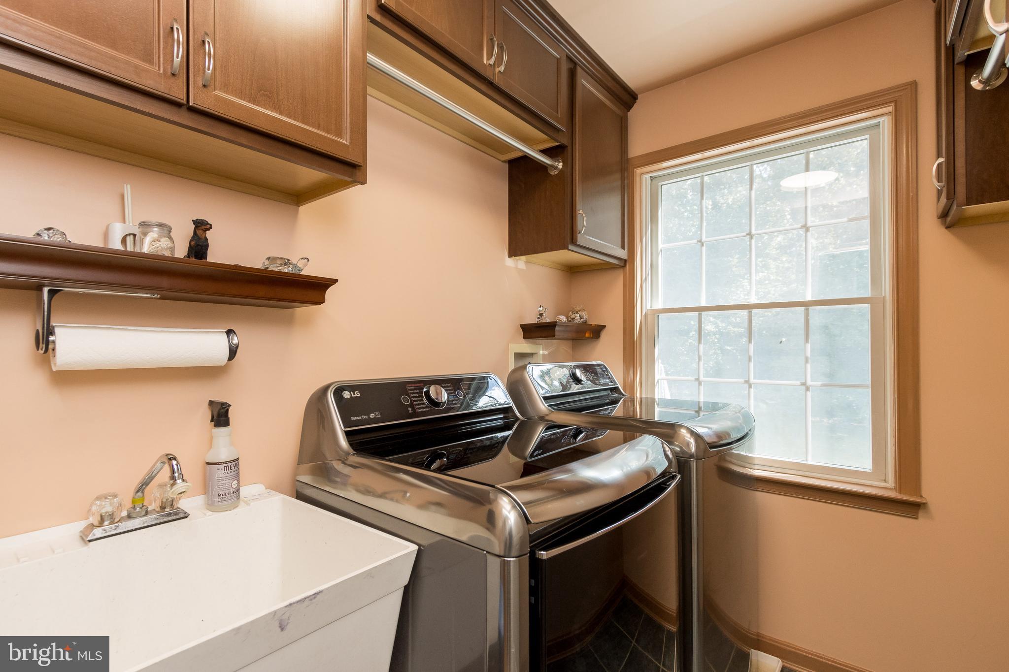 1652 Benson Road Westminster, MD 21158 - Photo 47 of 94 Utility room with wash tub and nice cabinets