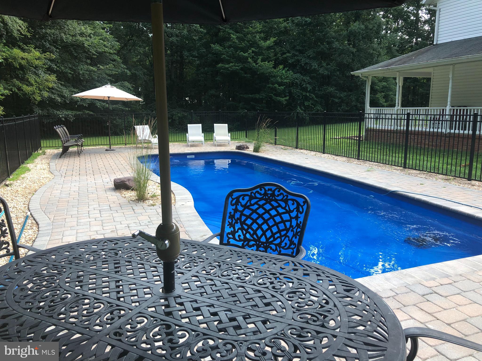 1652 Benson Road Westminster, MD 21158 - Photo 61 of 94 small ledge all around the pool for safety