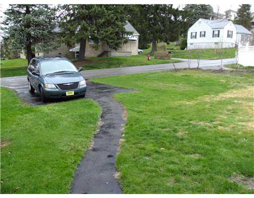 2650 River Road Vandergrift, PA 15690 - Photo 9 of 11 Land/Lot. A Black topped off street parking area big enough for 2 spaces offers additional parking to the 1 car detached garage!