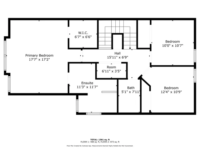 a view of a bench in the backyard