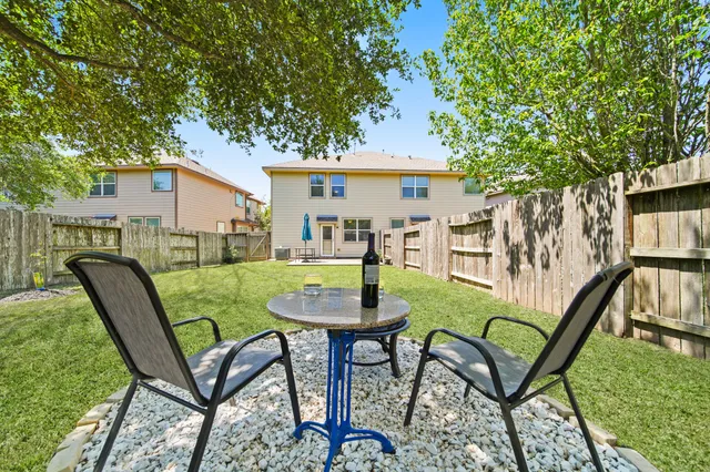 a view of a yard with plants