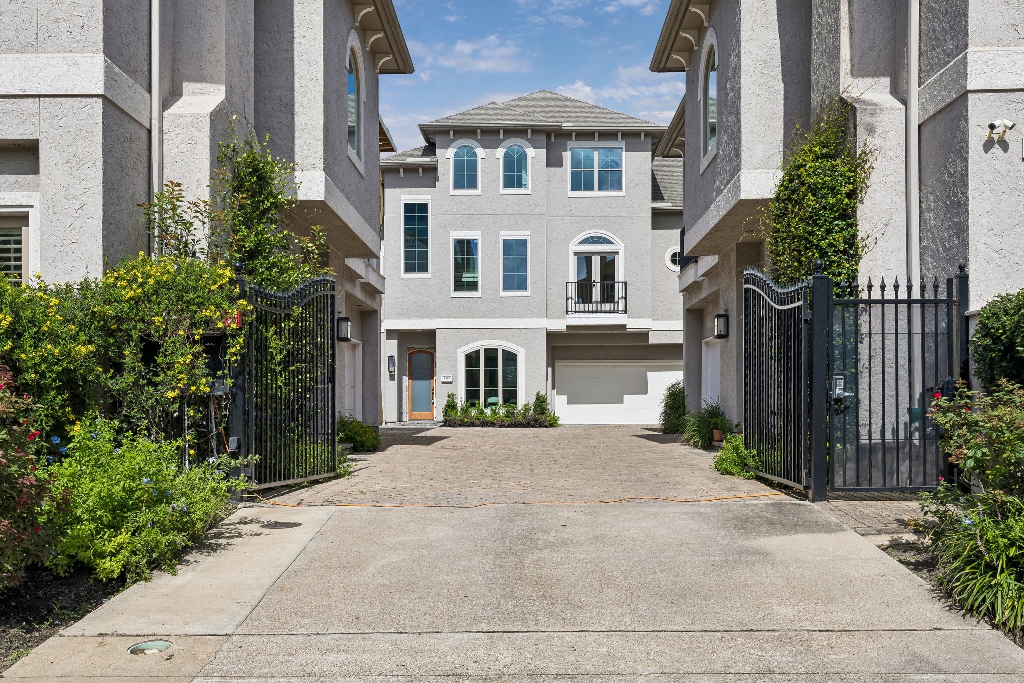 5329 Dora Street Houston, TX 77005 - Photo 2 of 43 Welcome to 5329 Dora Street, the perfect blend of luxury and convenience in this meticulously center home of a five-unit complex, offering multi-level living space. The perfect blend of community living and privacy, with a generous, epoxied two-car garage in a gated community.