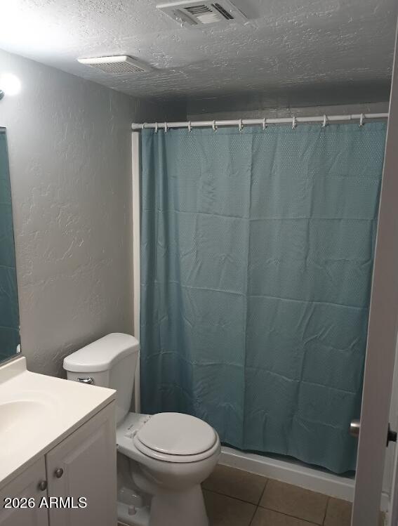 12221 West Bell Road, Unit 182 Surprise, AZ 85378 - Photo 6 of 10 a bathroom with a toilet and a shower