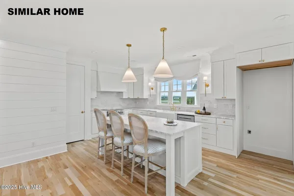 $1,395,000 | 607 South Topsail Drive, Surf City, NC 28445