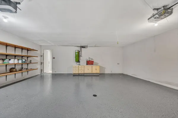 a view of empty room with cabinet