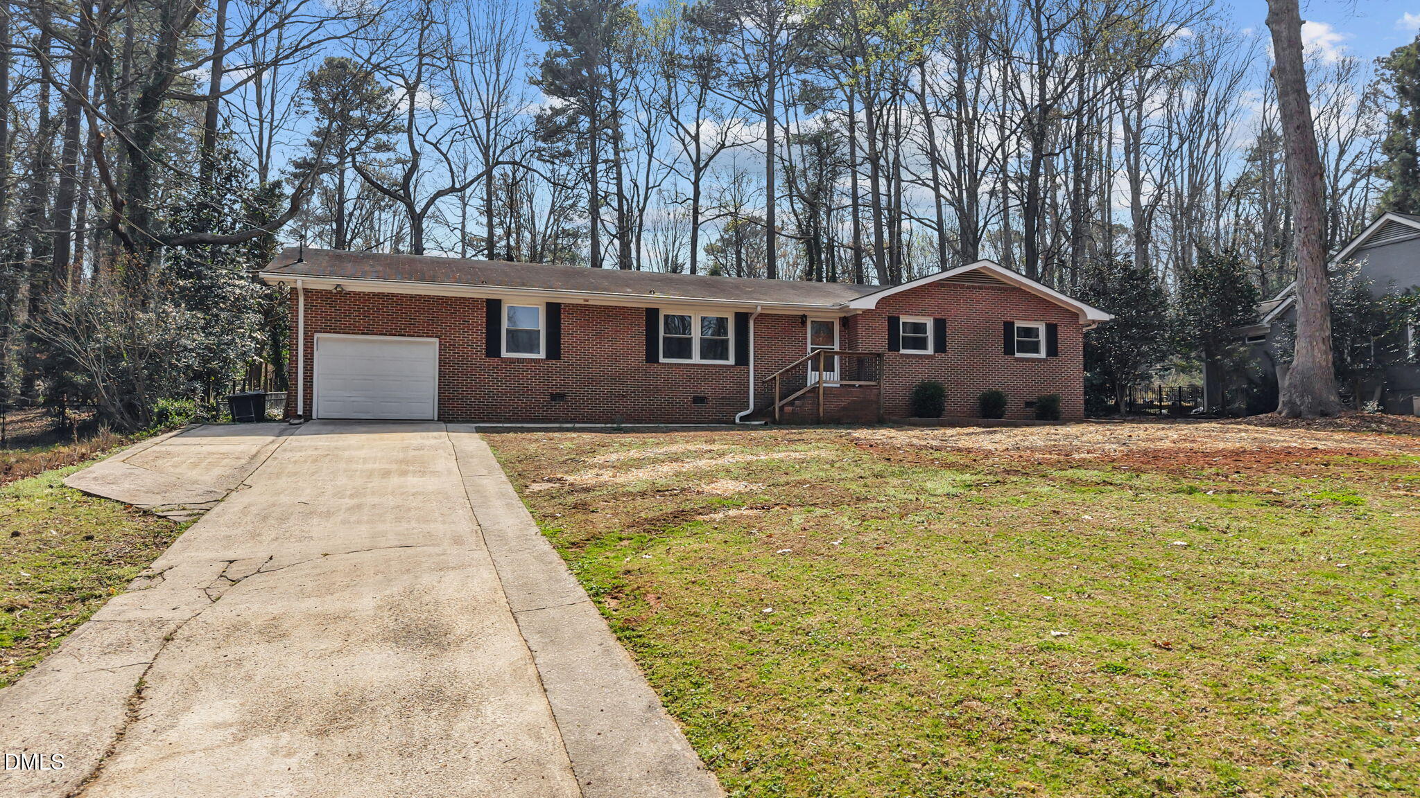 6409 Arrington Road Raleigh, NC 27607 - Photo 1 of 39 a front view of a house with a yard