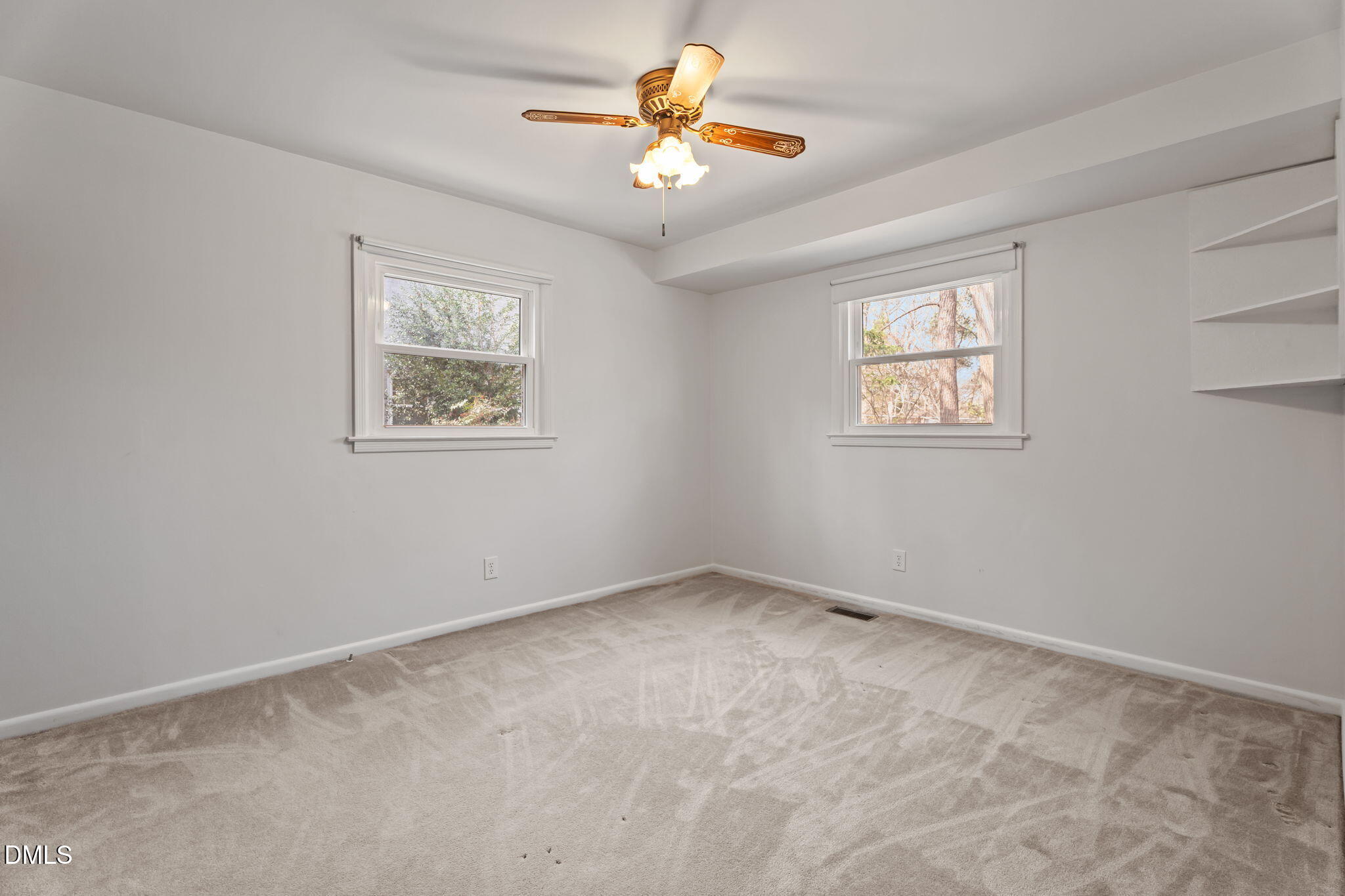 6409 Arrington Road Raleigh, NC 27607 - Photo 18 of 39 a view of an empty room with a window