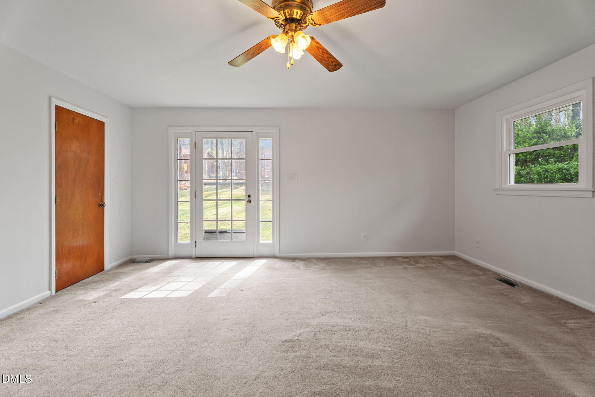 6409 Arrington Road Raleigh, NC 27607 - Photo 22 of 39 a view of an empty room with window