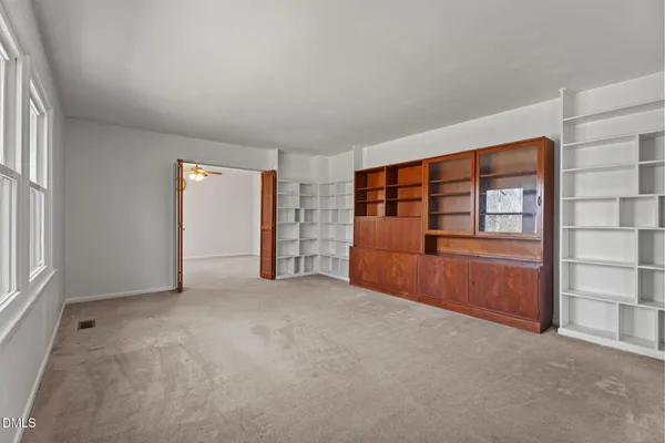an empty room with windows