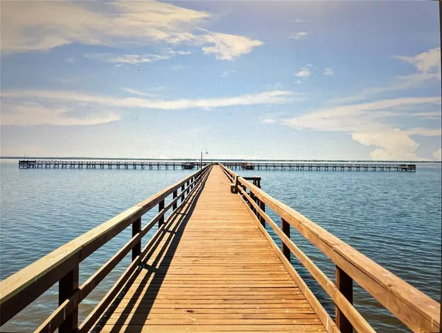 a view of city with ocean