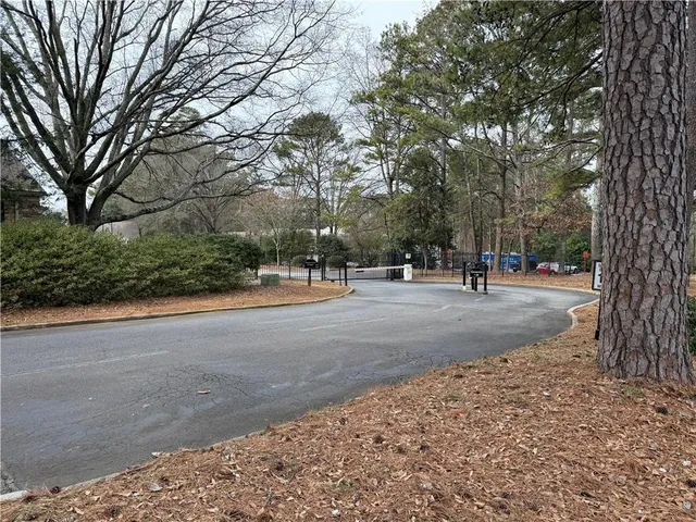 a view of road with trees