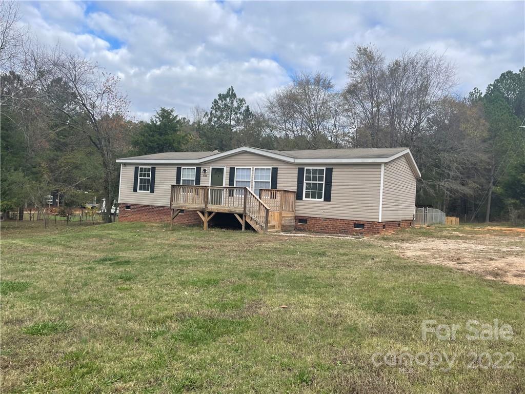 2542 Center Road Chester, SC 29706 - Photo 15 of 17 a view of a house with a backyard