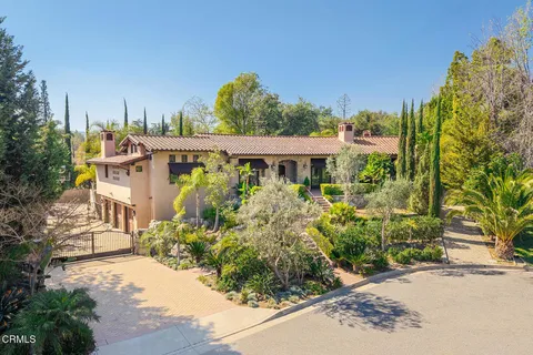 a house with trees in front of it