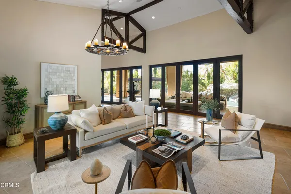 a bedroom with a bed and a lamp