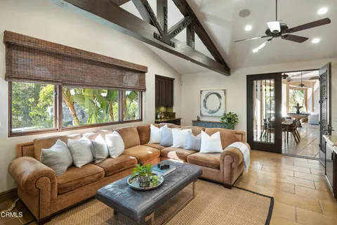a bathroom with a granite countertop sink toilet a mirror and shower
