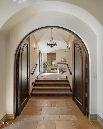 a kitchen with granite countertop wooden cabinets and a granite counter tops