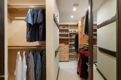 a bathroom with a toilet and a shower curtain
