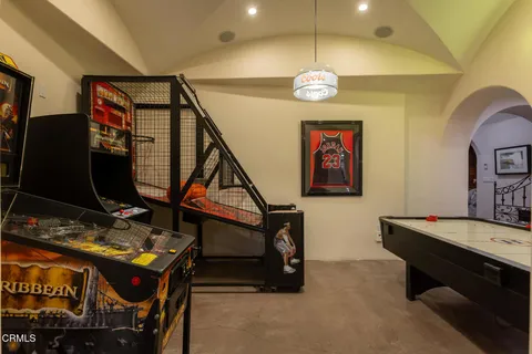 a kitchen with a table and chairs in it