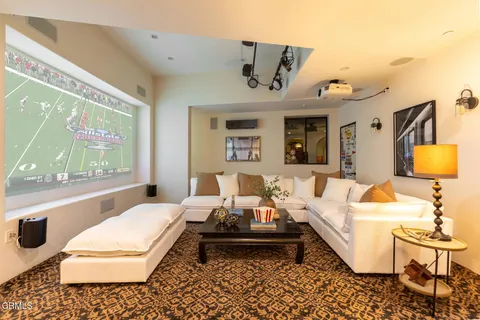 a kitchen with a table and chairs in it