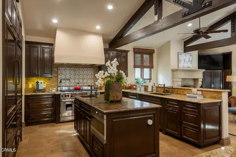 a view of a dining room with furniture and window