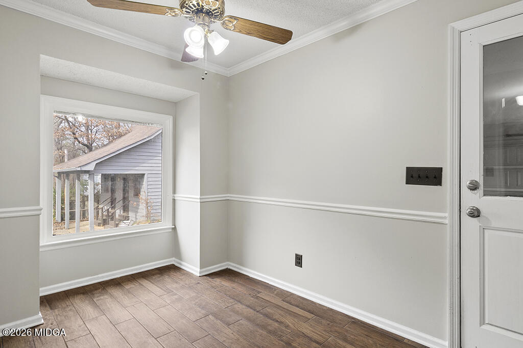 407 Smoke Rise Drive Warner Robins, GA 31088 - Photo 20 of 34 an empty room with windows and fan