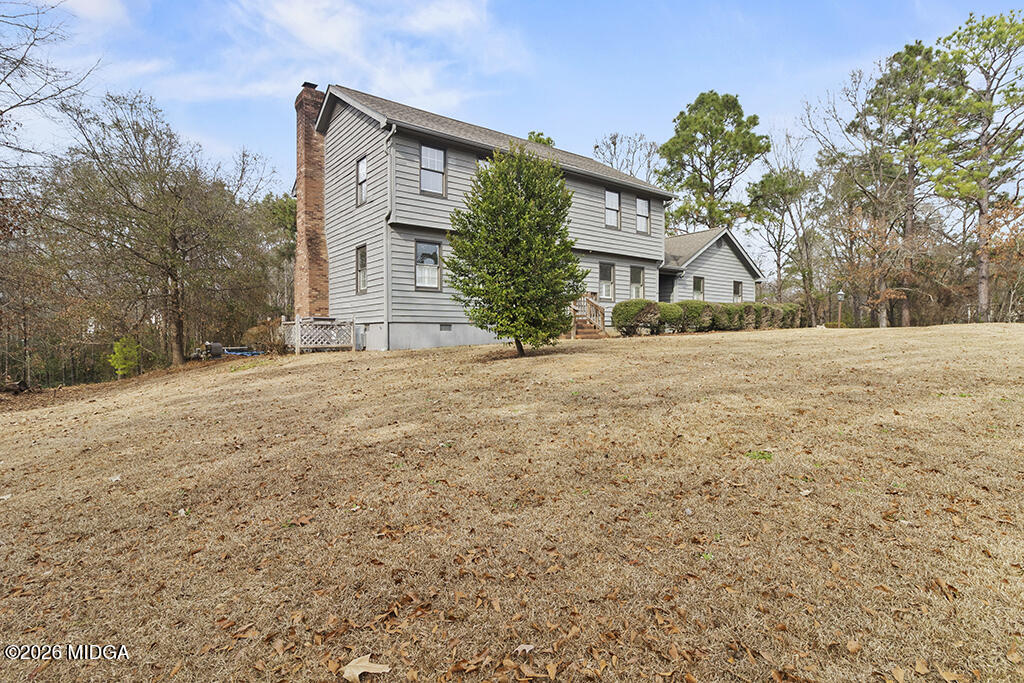 407 Smoke Rise Drive Warner Robins, GA 31088 - Photo 2 of 34 a front view of a house with a yard