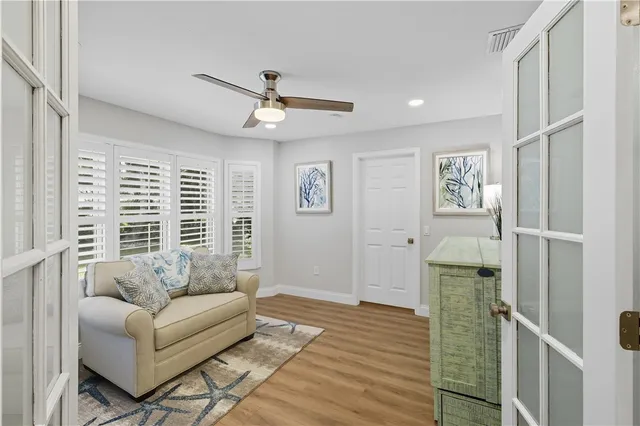 a living room with furniture and a window
