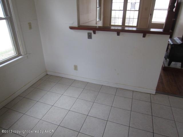 4112 South Ong Street Amarillo, TX 79110 - Photo 8 of 16 a view of a kitchen with washing machine