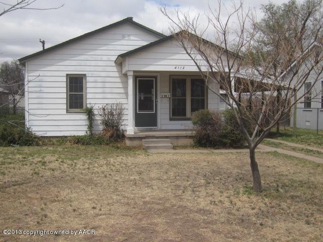 4112 South Ong Street Amarillo, TX 79110 - Photo 10 of 16 a front view of a house with garden