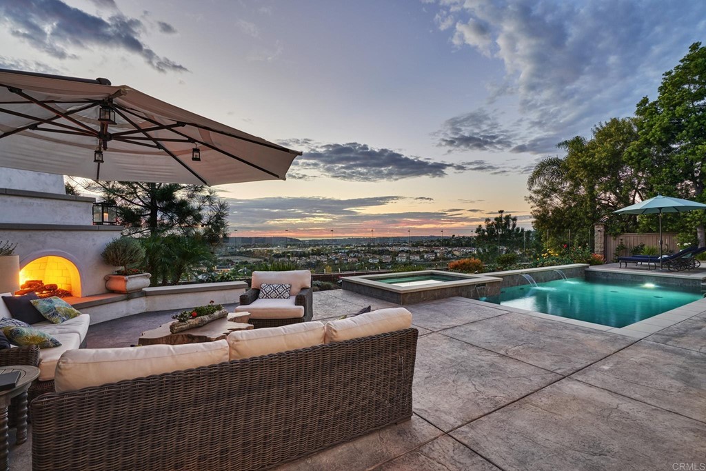 3566 Calle Palmito Carlsbad, CA 92009 - Photo 2 of 40 a view of swimming pool with seating area and barbeque oven