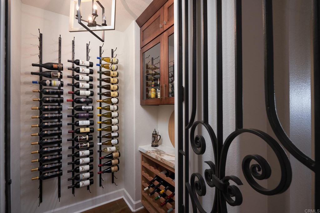 3566 Calle Palmito Carlsbad, CA 92009 - Photo 12 of 40 a bathroom with a large mirror and a shower
