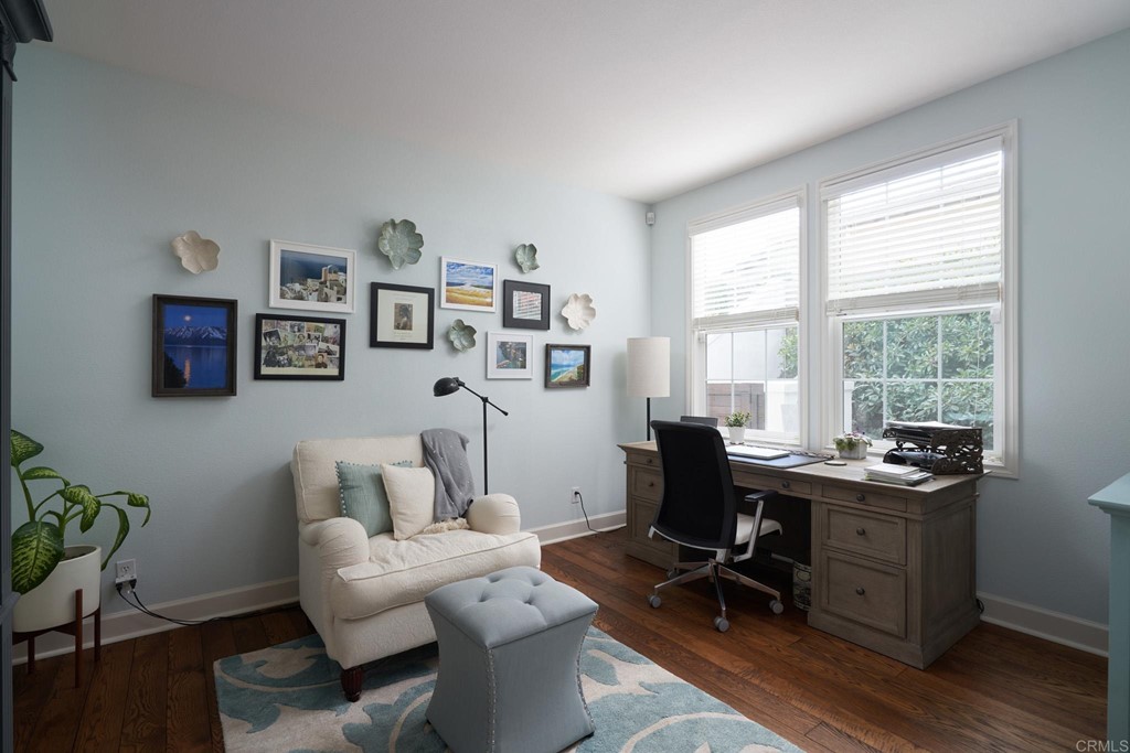 3566 Calle Palmito Carlsbad, CA 92009 - Photo 13 of 40 a living room with furniture a rug and a window