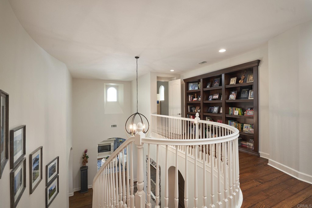 3566 Calle Palmito Carlsbad, CA 92009 - Photo 16 of 40 a view of entryway and hall with wooden floor