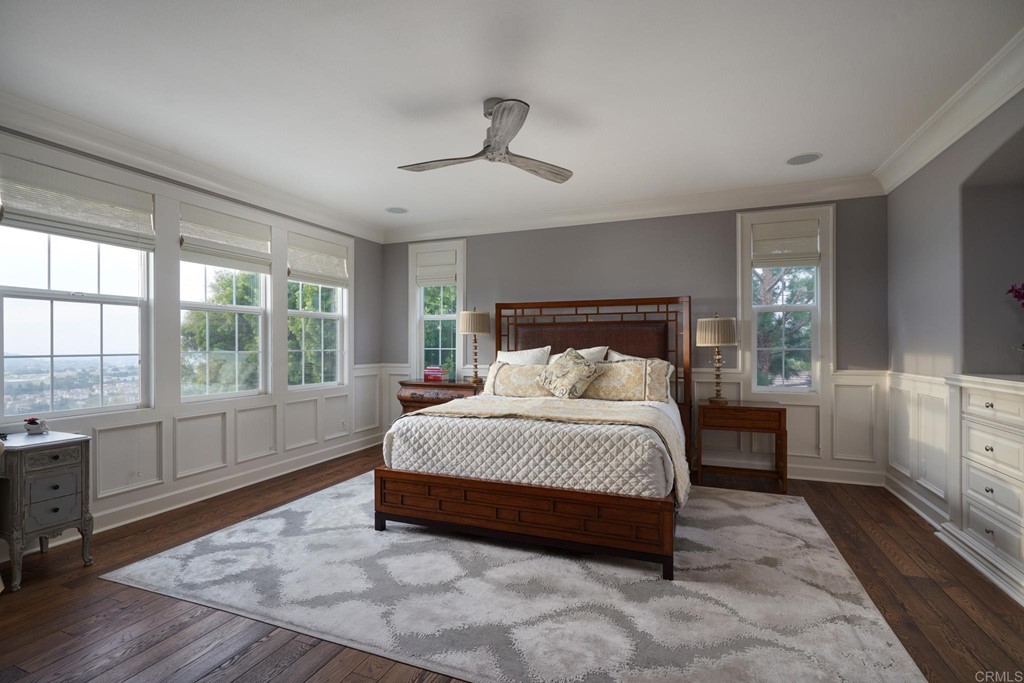3566 Calle Palmito Carlsbad, CA 92009 - Photo 17 of 40 a spacious bedroom with a large bed and a large window