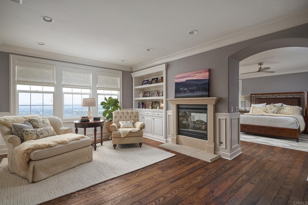 3566 Calle Palmito Carlsbad, CA 92009 - Photo 18 of 40 a living room with furniture fireplace and window
