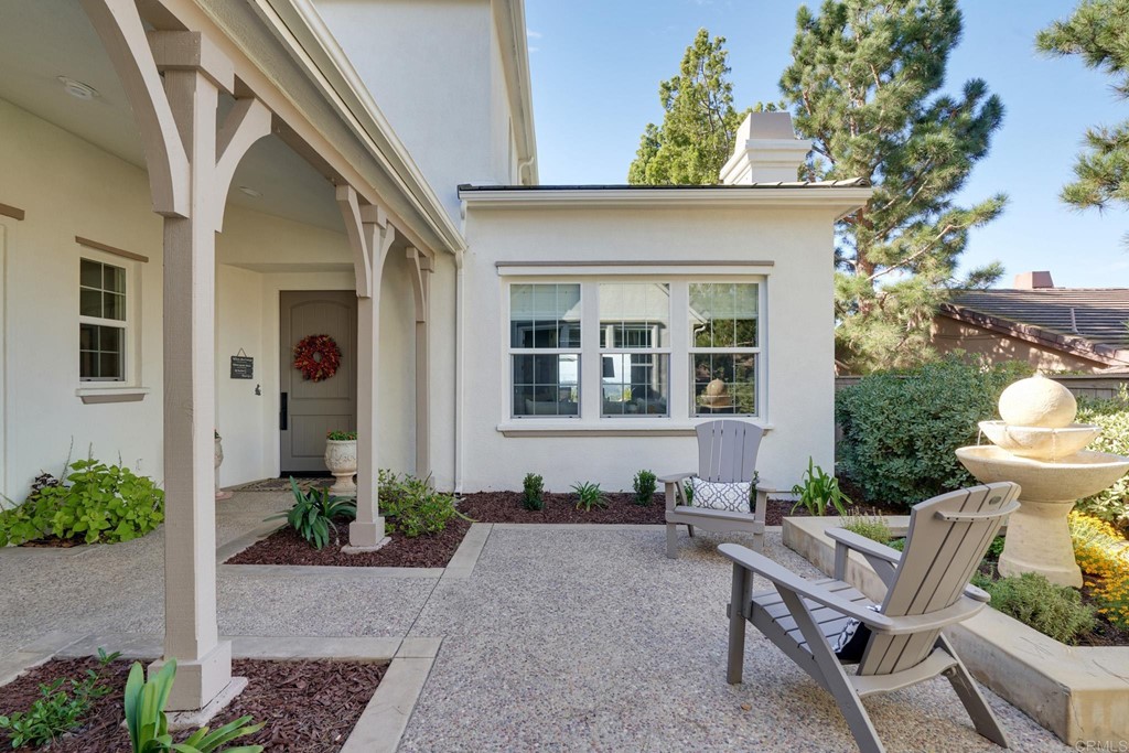 3566 Calle Palmito Carlsbad, CA 92009 - Photo 26 of 40 a front view of a house with sitting area