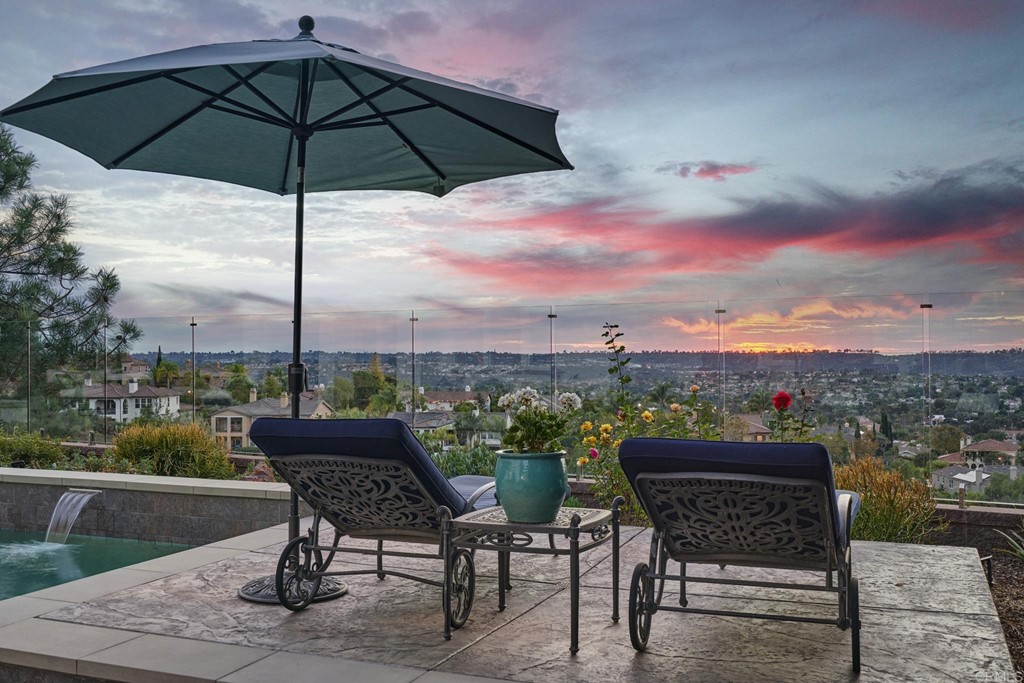3566 Calle Palmito Carlsbad, CA 92009 - Photo 32 of 40 a view of a terrace with furniture and a yard