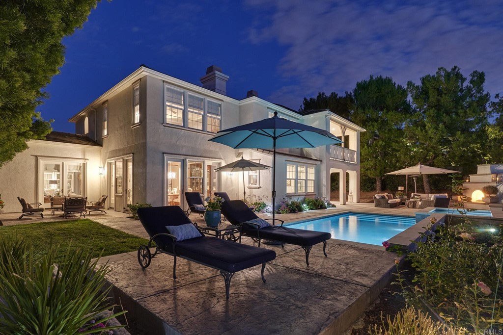 3566 Calle Palmito Carlsbad, CA 92009 - Photo 36 of 40 a view of a house with backyard water fountain and sitting area