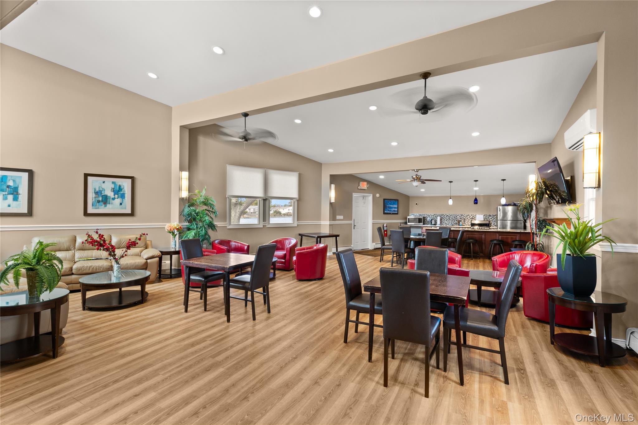 441 Mariners Way Copiague, NY 11726 - Photo 13 of 15 a view of a dining room with furniture and wooden floor