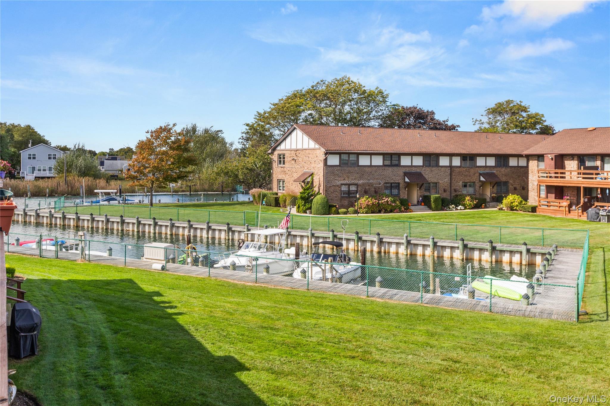 441 Mariners Way Copiague, NY 11726 - Photo 9 of 15 a view of a house with a big yard