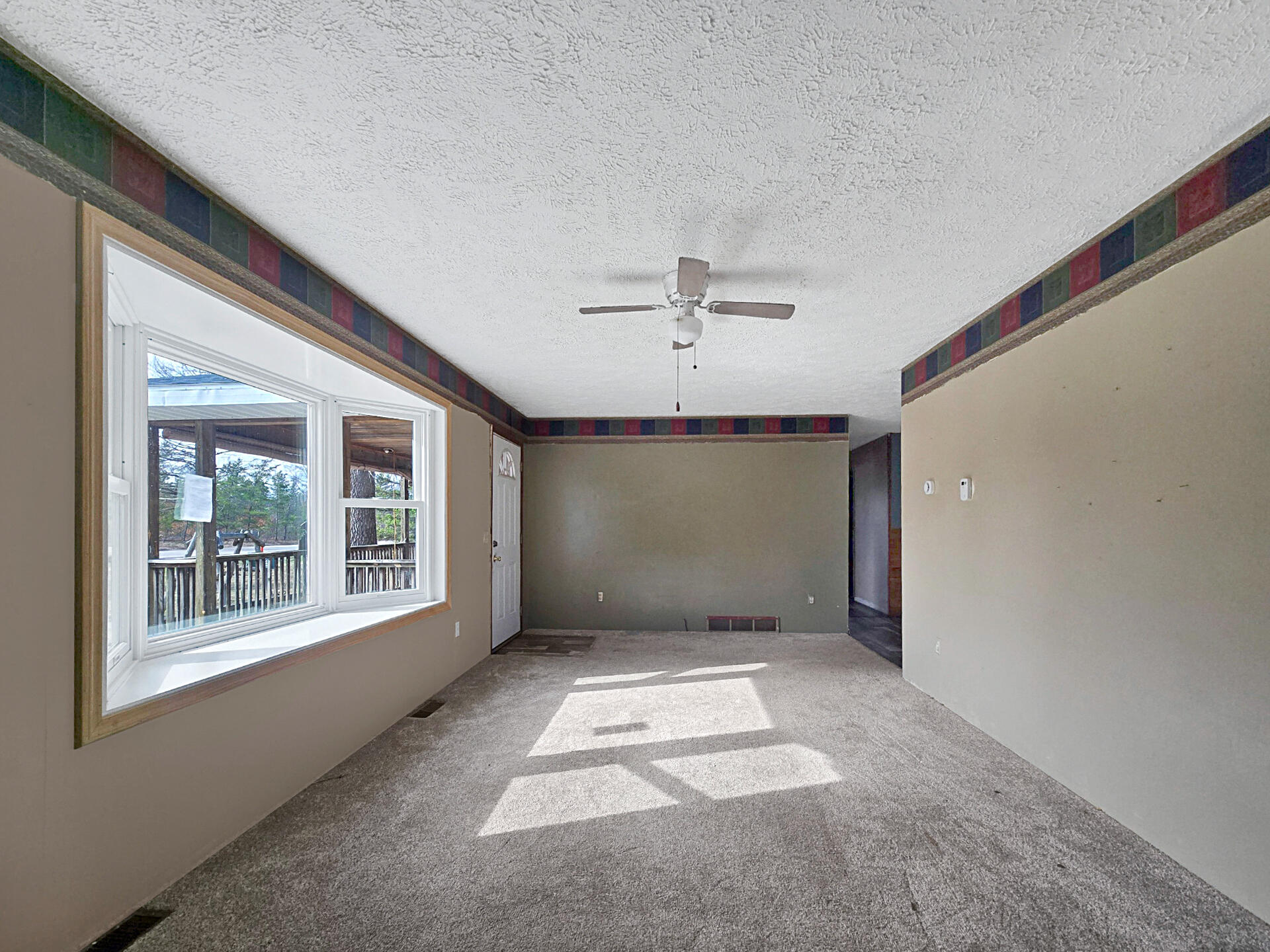 94 North Wilcox Bridge Road Grayling, MI 49738 - Photo 6 of 16 Living Room