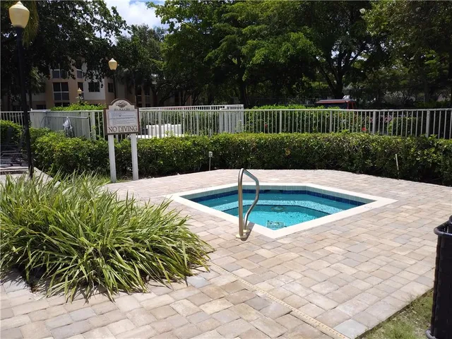 a swimming pool with yard