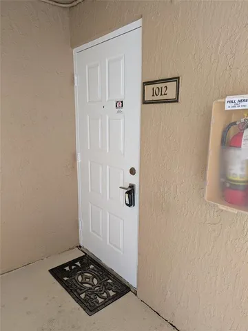 a bathroom with a sink a toilet a shower and a mirror