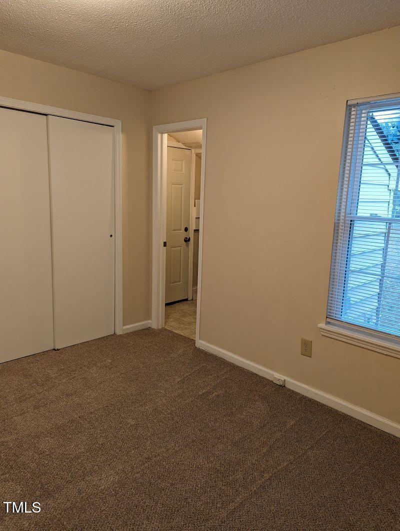 2616 Stewart Drive, Unit C Raleigh, NC 27603 - Photo 23 of 25 Master Bedroom Rear to Laundry Room