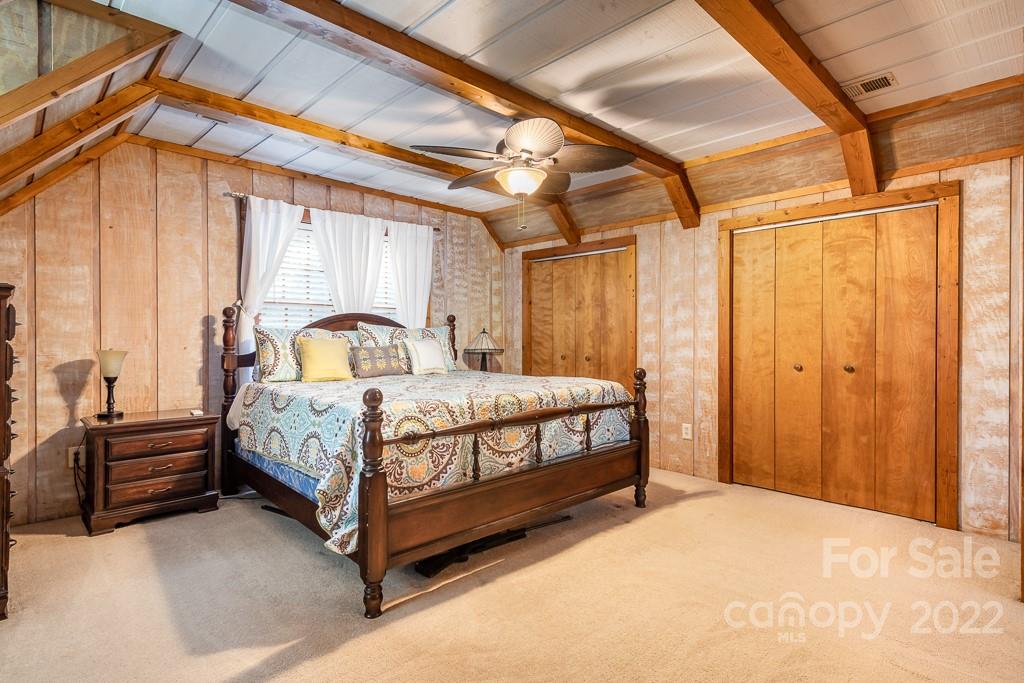 7224 Price Point Denver, NC 28037 - Photo 4 of 31 a bedroom with a bed and a large window