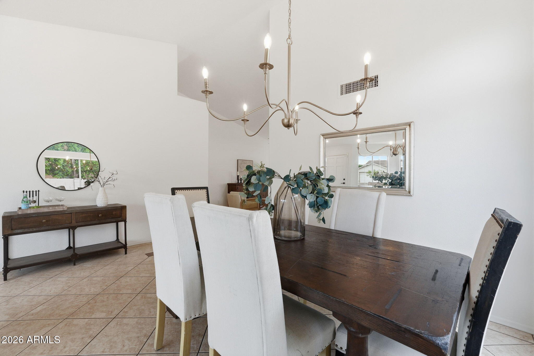 7756 West Hearn Road Peoria, AZ 85381 - Photo 20 of 41 a view of a dining room with furniture