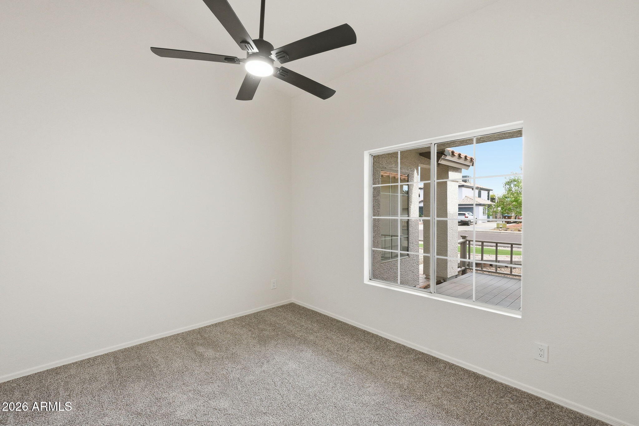 7756 West Hearn Road Peoria, AZ 85381 - Photo 26 of 41 an empty room with a window